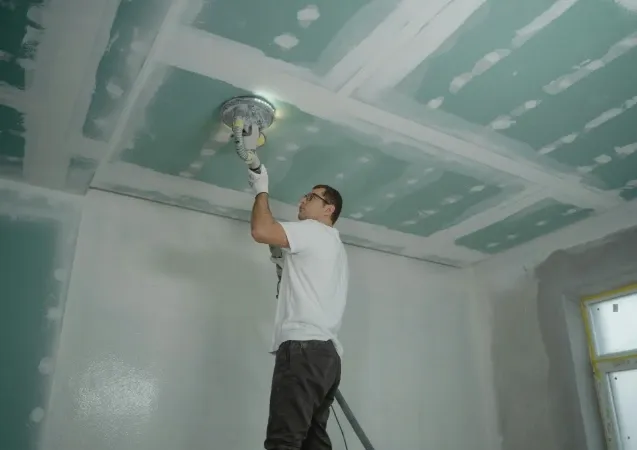 pro drywaller installing drywall